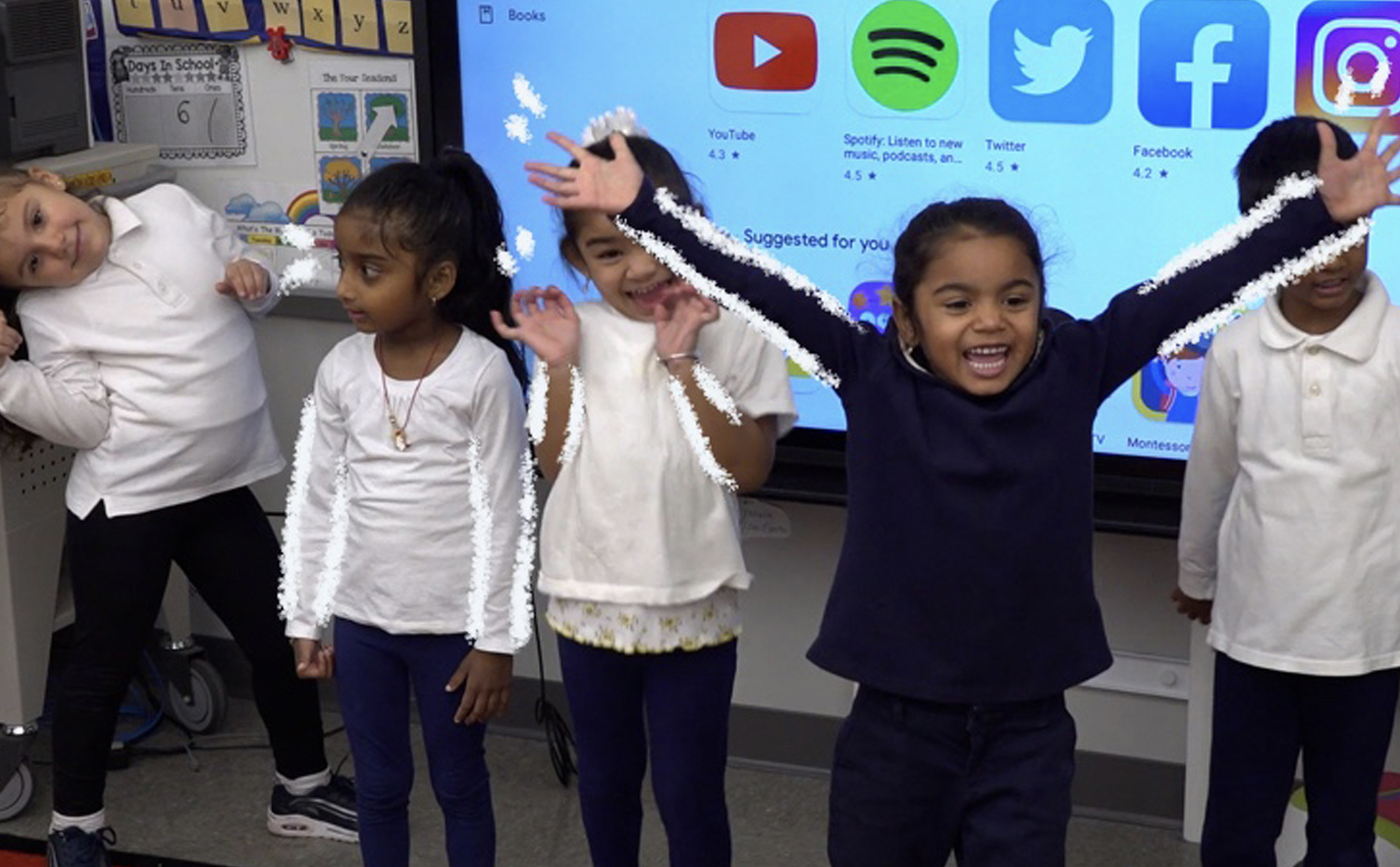 Students in a classroom displaying the feeling of being ecstatic!